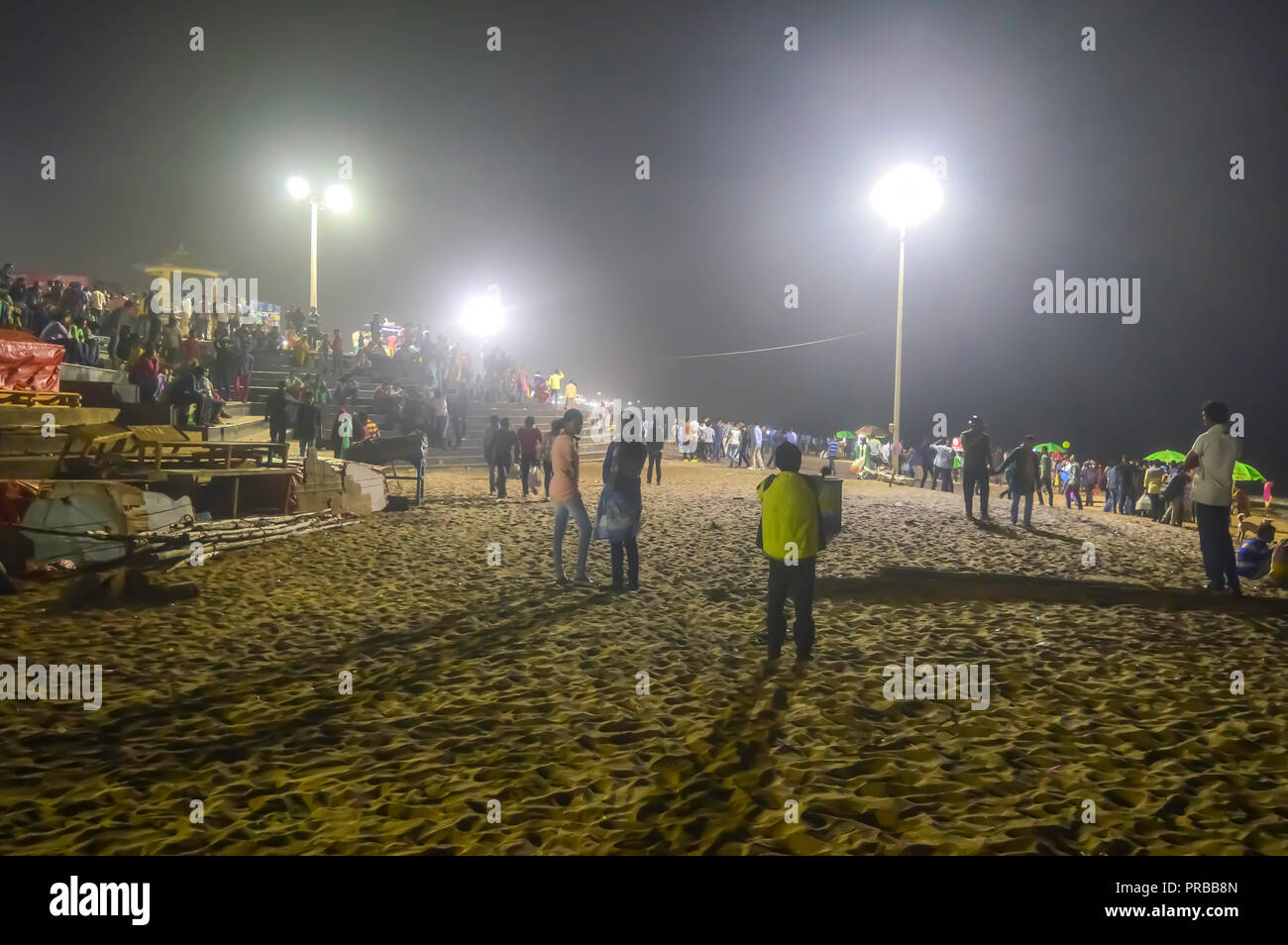 People Crowd At Night After Sunset In A Beach Party In Summer Vacation Goa India Concept Of Nightlife Holiday Entertainment People Crowd At Night After Sunset In A Beach Party In Summer Vacation Goa India Concept Of Nightlife Holiday Entertainment