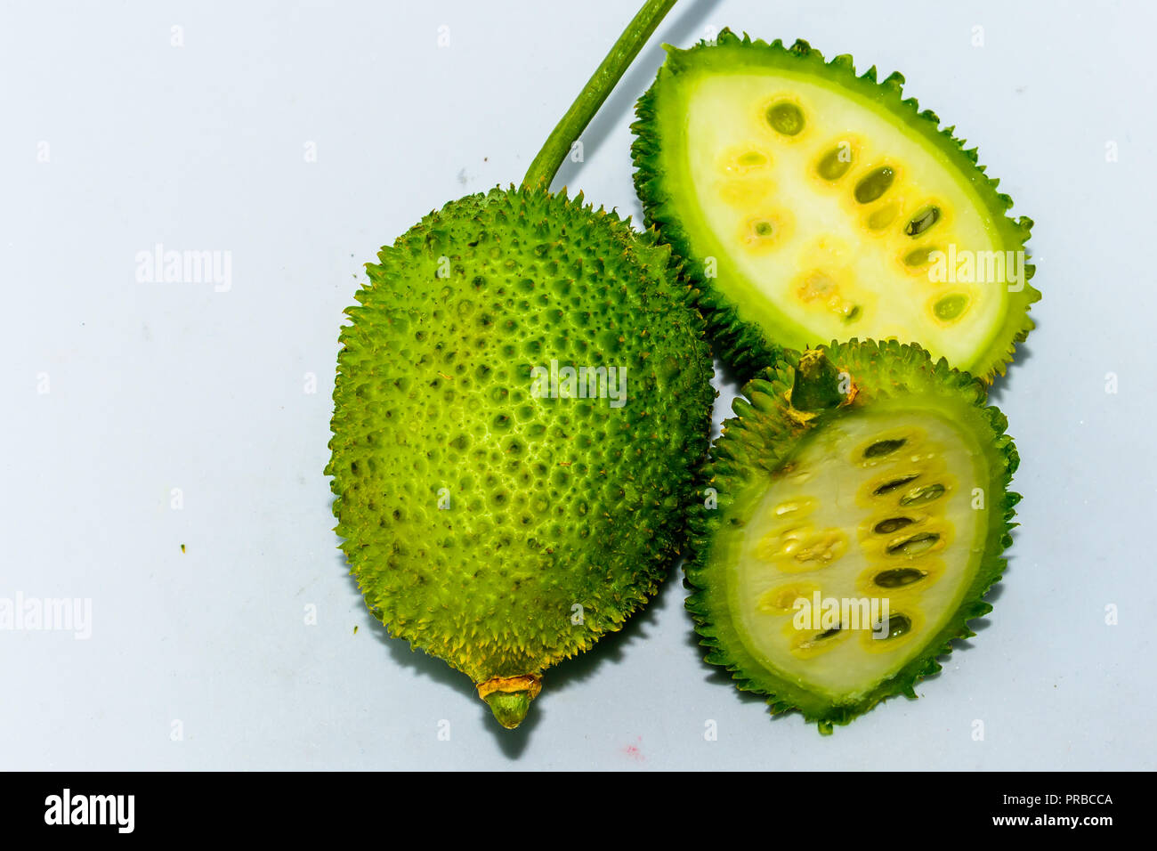 Spiny green bitter gourd green fruit vegetable on white background