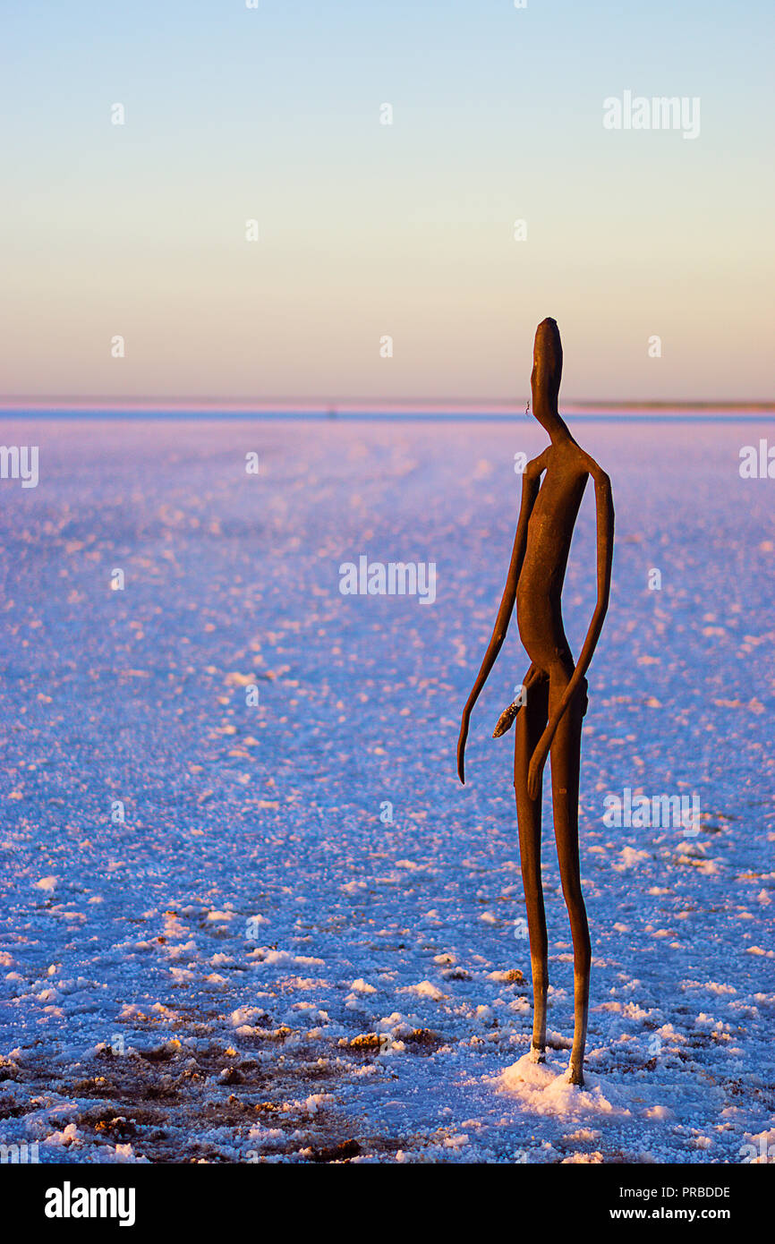 Steel figures by sculptor Antony Gormley for Perth International Arts Festival are dotted across Lake Ballard near Menzies in Western Australia Stock Photo