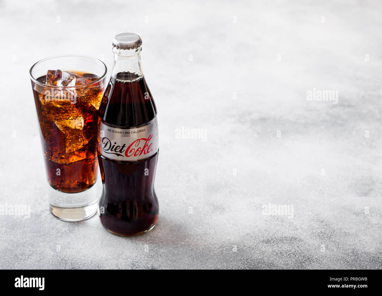 LONDON, UK - SEPTEMBER 28, 2018: Glass and bottle of Diet Coke Coca Cola  soda drink with ice cubes and bubbles on stone kitchen background Stock  Photo - Alamy