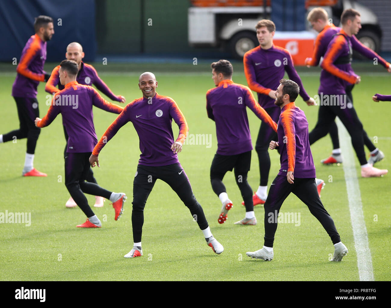 Manchester City's Fernandinho (left) and Bernardo Silva during a training session at the City Football Academy, Manchester. Stock Photo