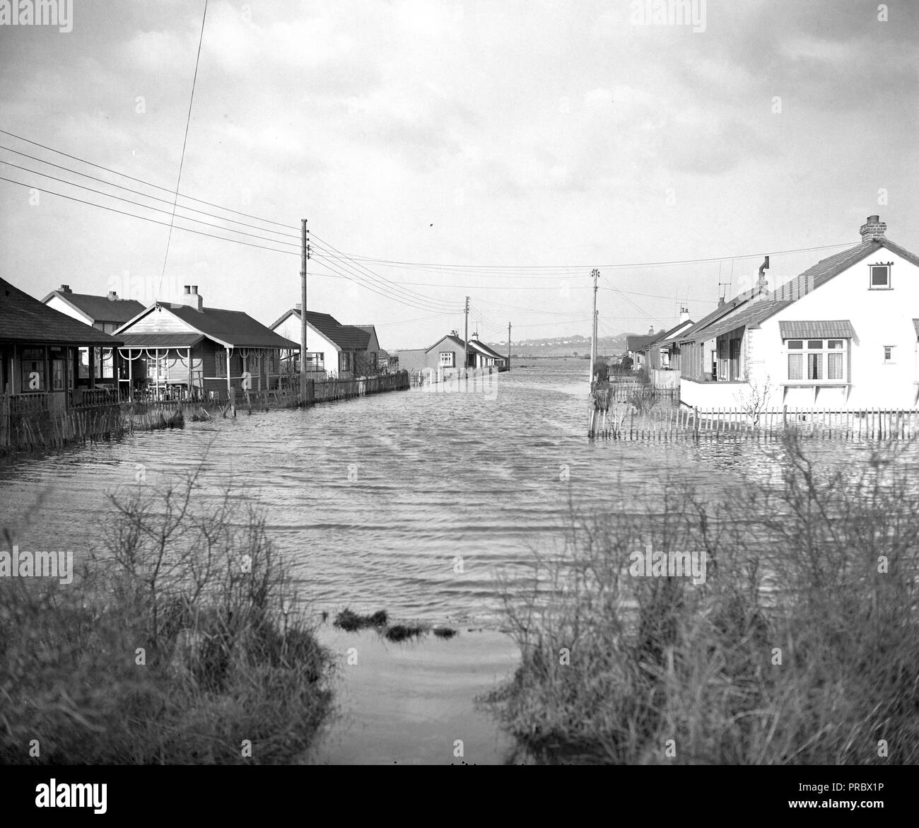 Flooded bungalows line a Canvey Island street Stock Photo Alamy Flooded bungalows line a Canvey Island street Stock Photo Alamy