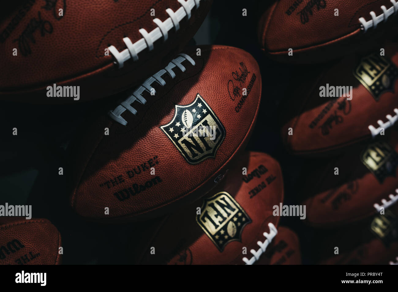 NEW YORK, USA MAY 28, 2018 Rows of american football balls in NFL