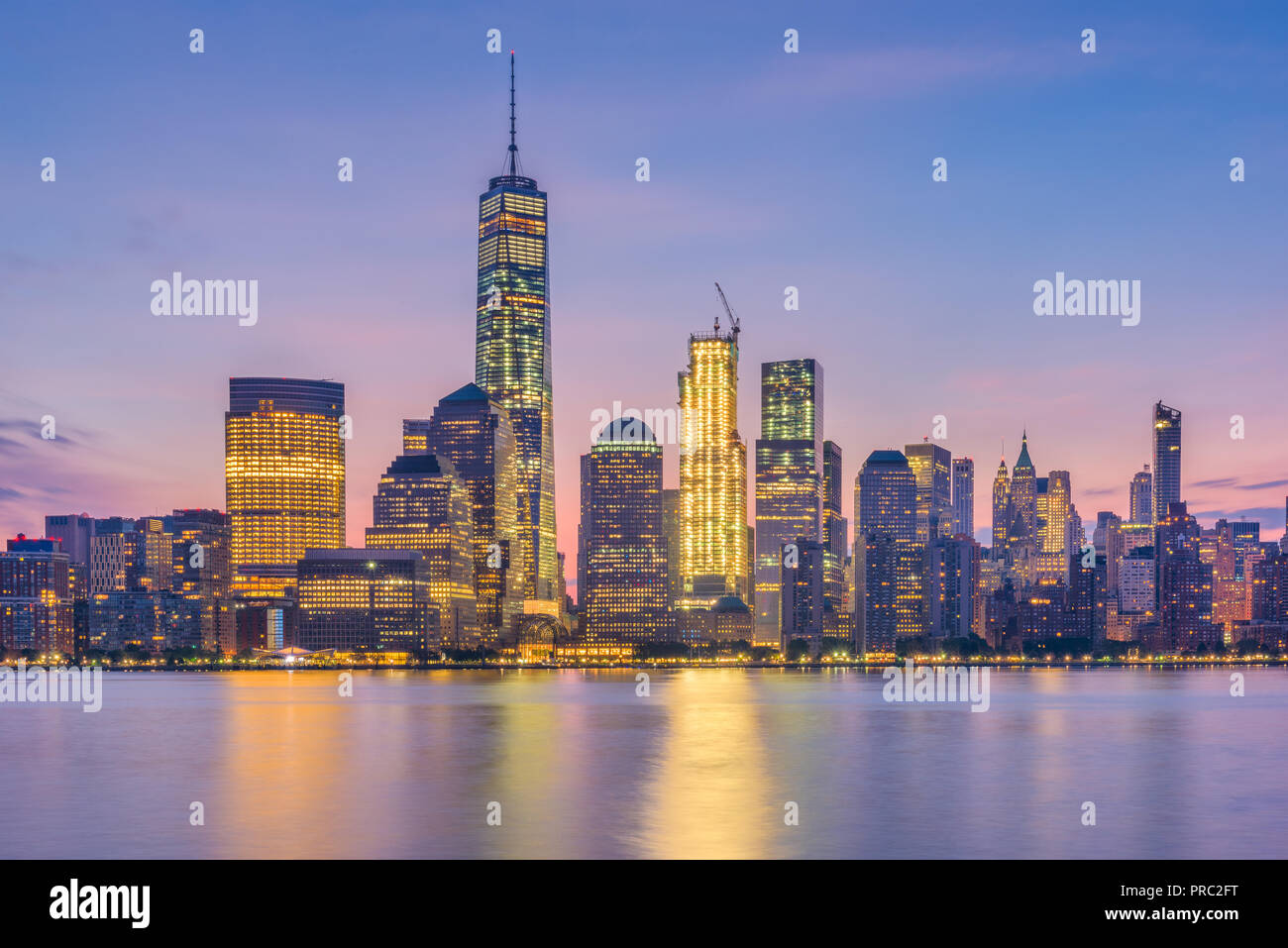 New York, New York, Lower Manhattan Skyline from across the Hudson River at dawn. Stock Photo
