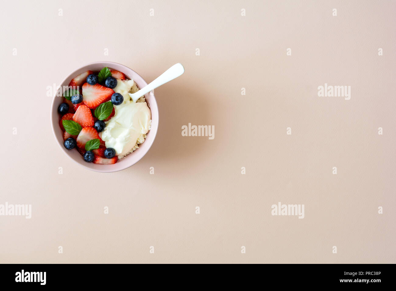 Bowl With Cottage Cheese Cream Strawberry Blueberry And Mint