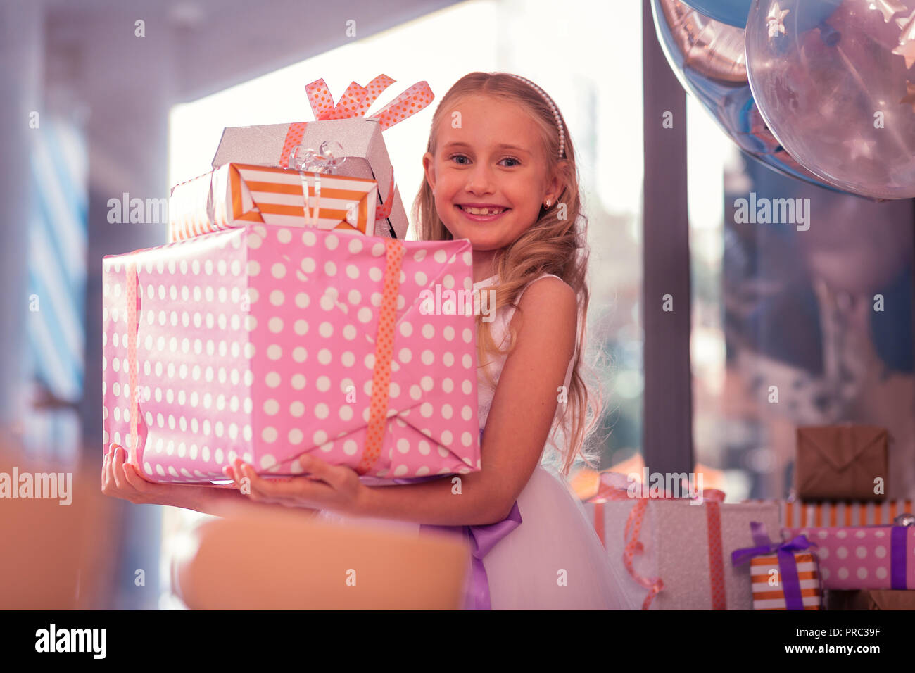 Happy Smiling Little Girl between Gifts Stock Photo - Image of