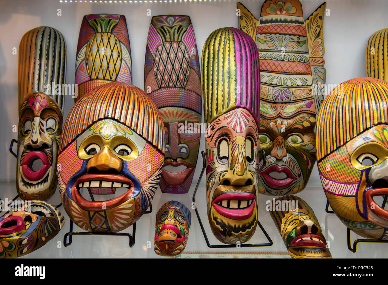 South America, Colombia, Cartagena. Traditional handicraft souvenirs for  sale in Old Town. Colorful masks. Photographed with permission of store  owner Stock Photo - Alamy