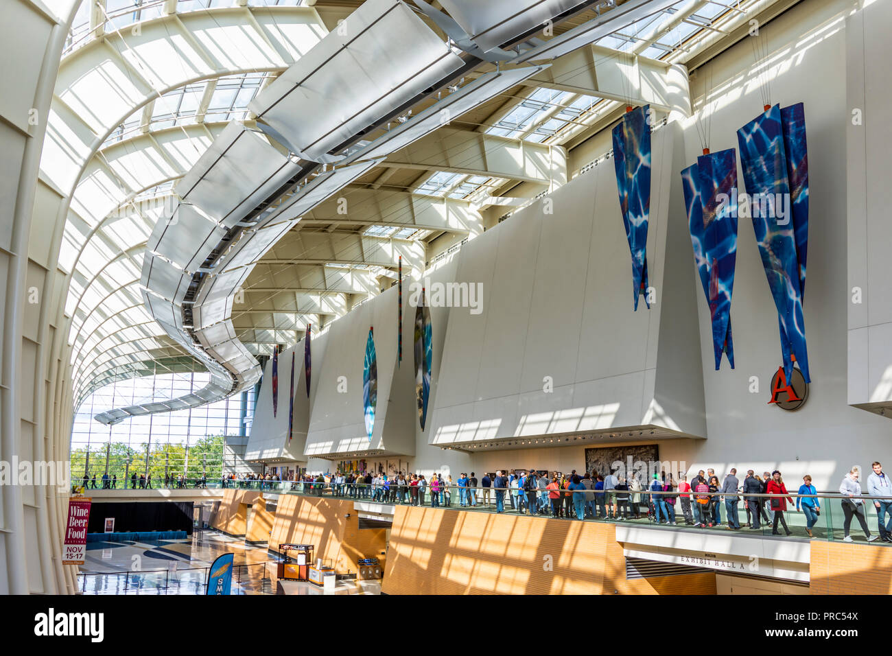 Visitors view art entered in the Artprize 2018 competition at the DeVos