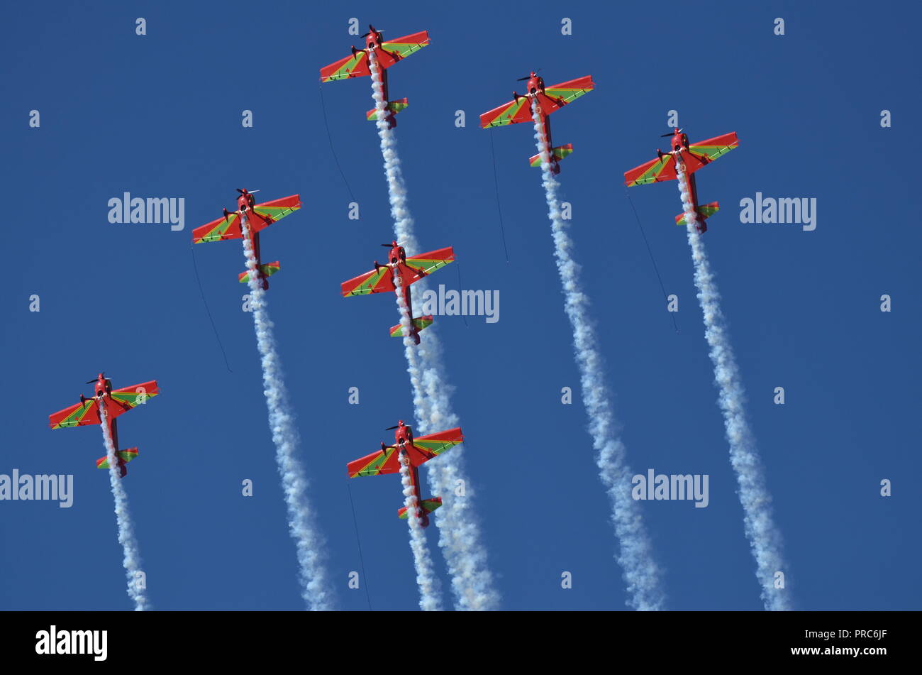 Four 4 Royal Moroccan Air Force aerobatic display team Marche Verte Green  March CAP-231 planes flying inverted with smoke wires Stock Photo - Alamy