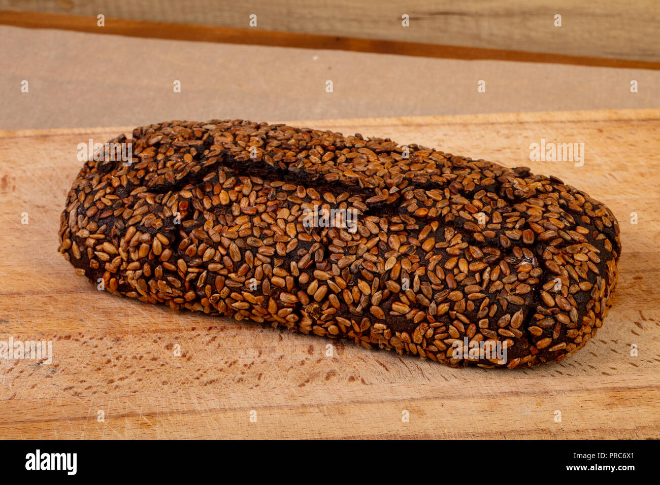 Homemade tasty bread over wooden background Stock Photo - Alamy