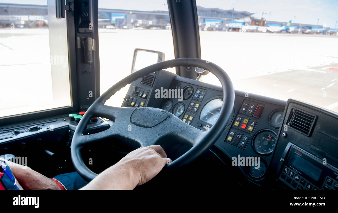 Closeup image of bus steering wheel working in airport Stock Photo Alamy