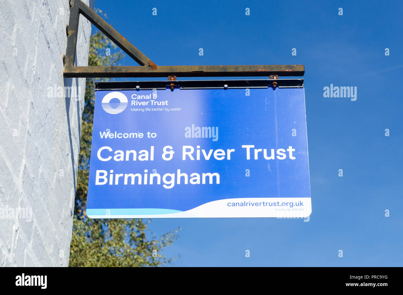 Blue Canal and River Trust sign on the canal towpath in Birmingham city centre Stock Photo