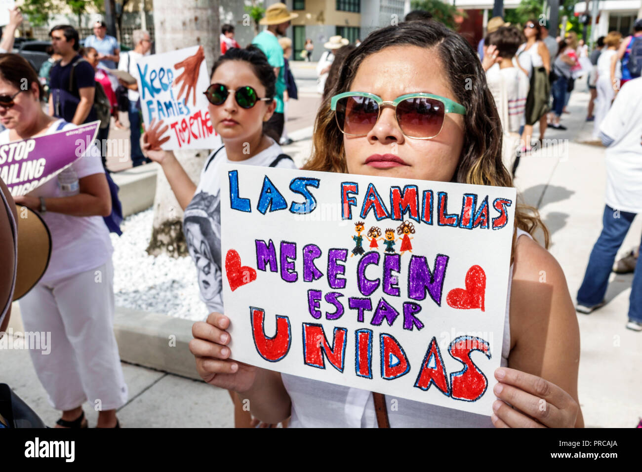 Miami Florida,demonstration demonstrating protest protesting,Families Belong Together Free Children illegal immigration,media,TV news,Mexican border f Stock Photo