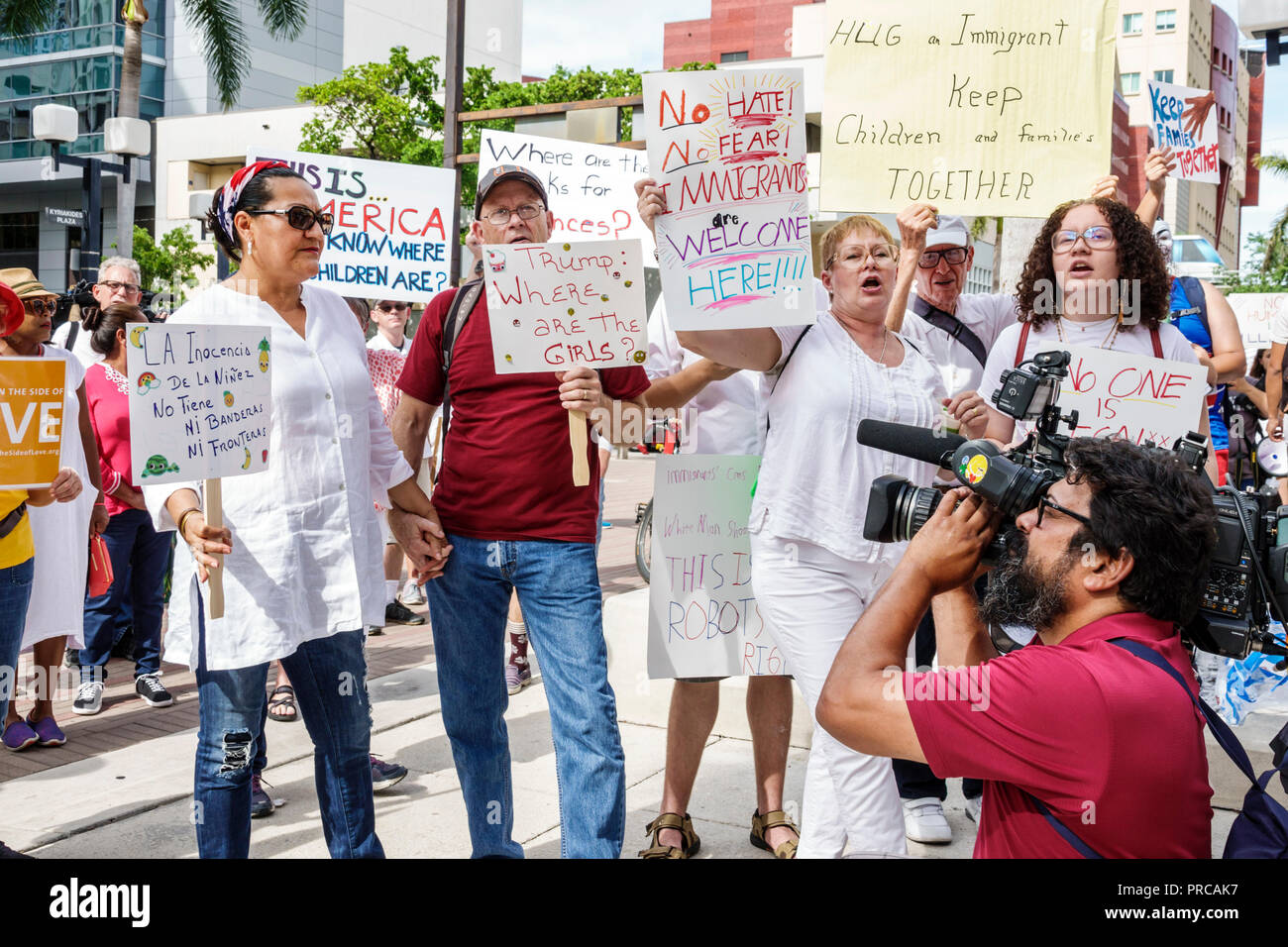 Miami Florida,demonstration demonstrating protest protesting,Families Belong Together Free Children illegal immigration,media,digital video videocam c Stock Photo