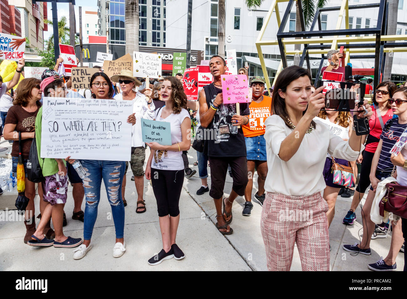 Miami Florida,demonstration demonstrating protest protesting,Families Belong Together Free Children illegal immigration,social media,Mexican border fa Stock Photo