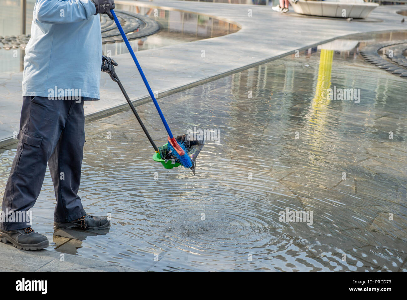 cleaning with scoop and Fontana broom Stock Photo Alamy