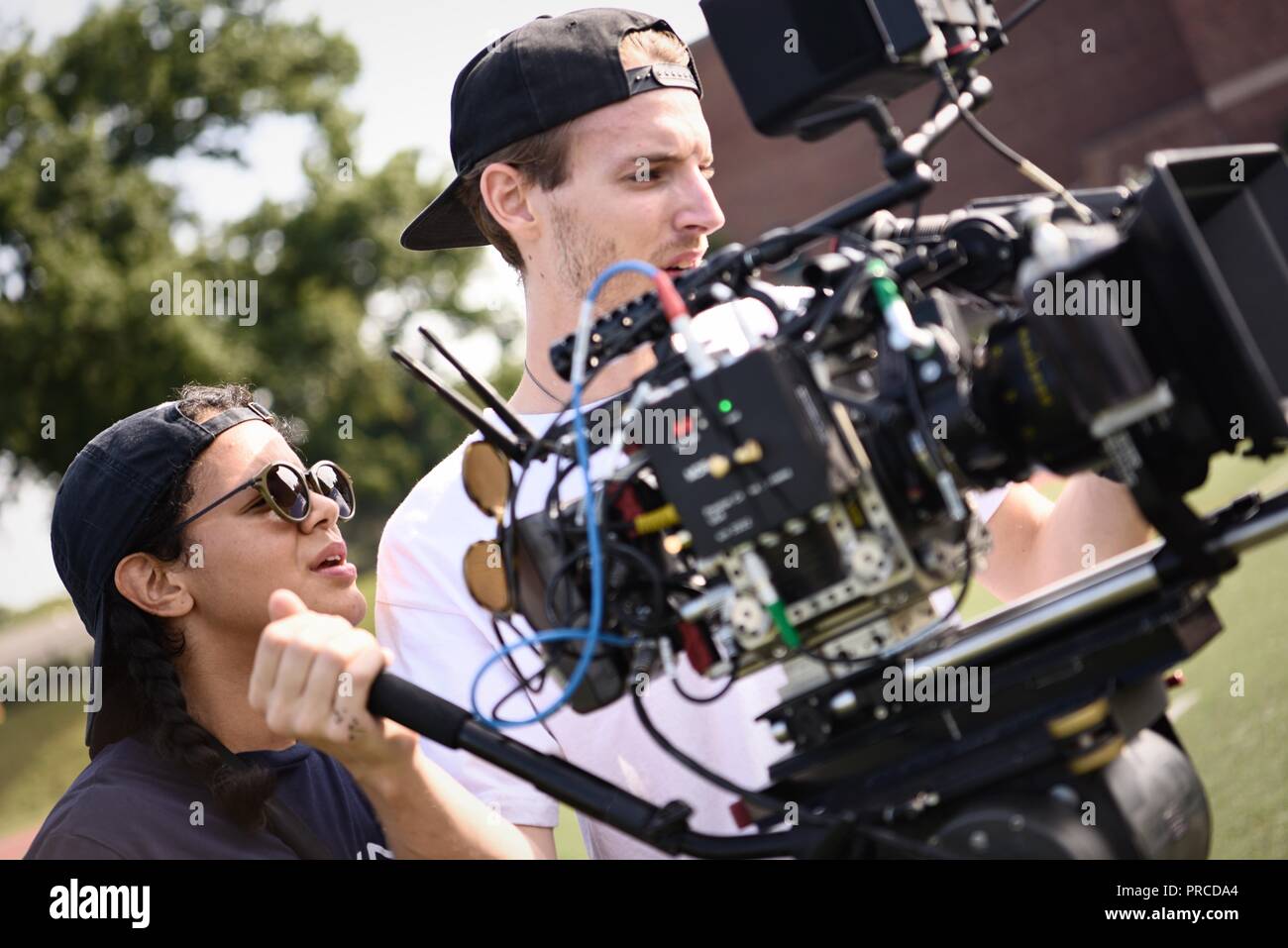 New York, NY; Aug 2018: A cinematographer frames up his shot Stock Photo