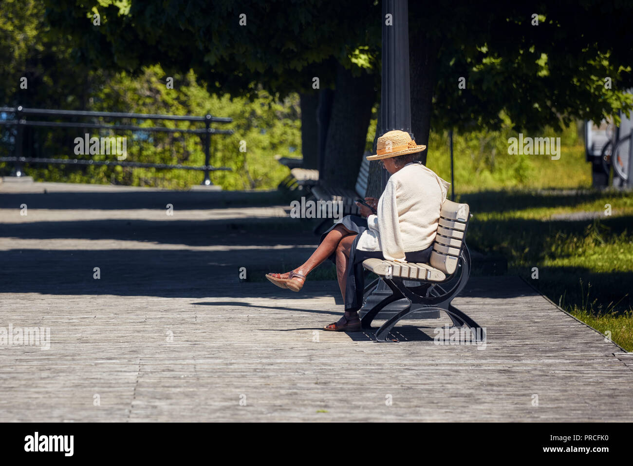 Leg woman sitting on bench hi-res stock photography and images - Alamy