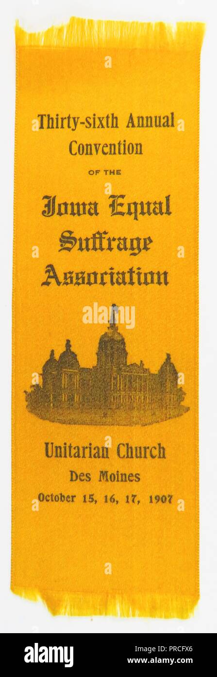 Yellow suffrage ribbon or badge, issued by the Iowa Equal Suffrage Association, for their 'Thirty-sixth Annual Convention, ' which was held in the Unitarian Church of Des Moines, Iowa, manufactured for the American market, October, 1907. Photography by Emilia van Beugen. () Stock Photo