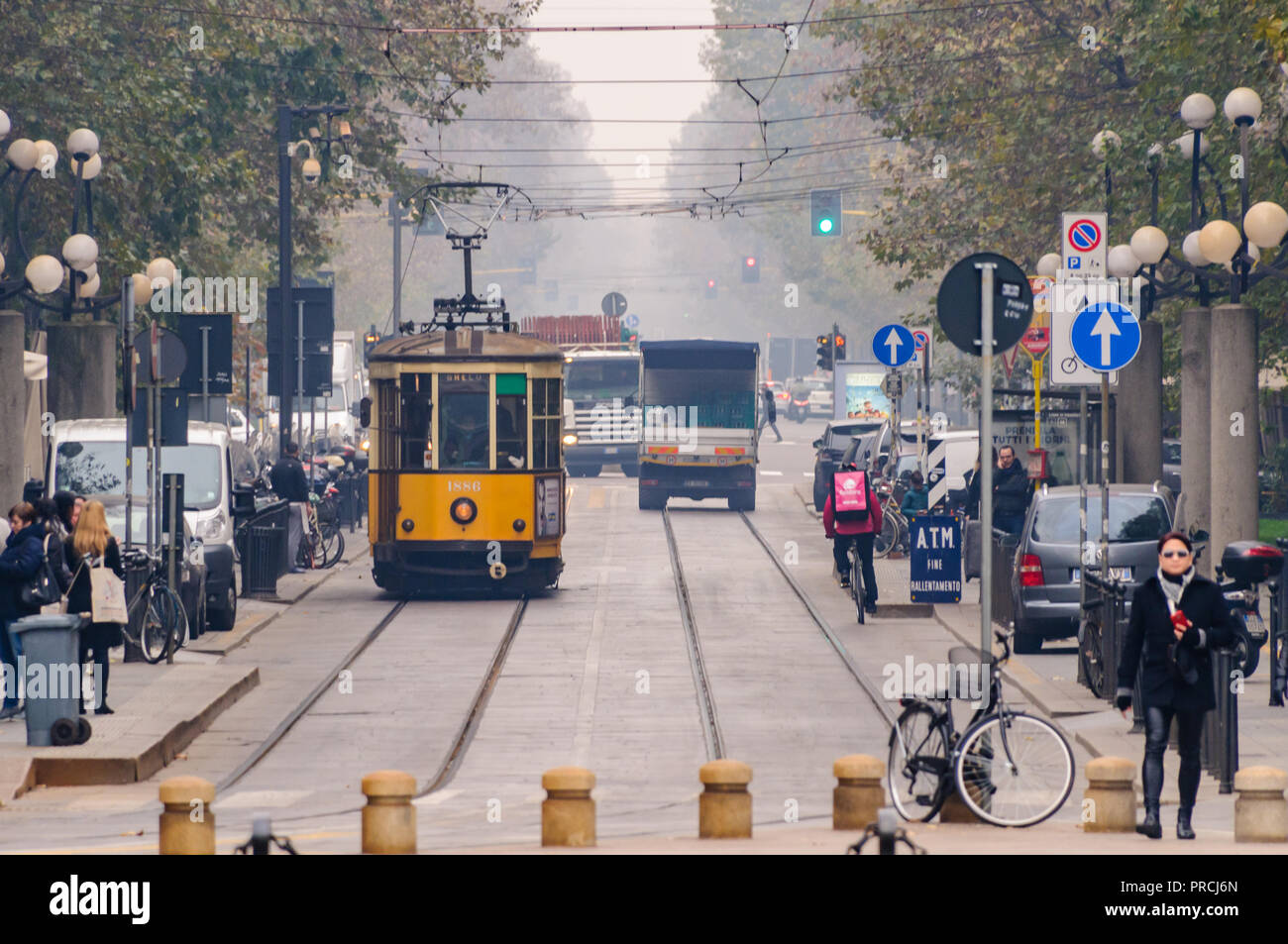 Trams and lorries on the roads of Milan, Italy Stock Photo