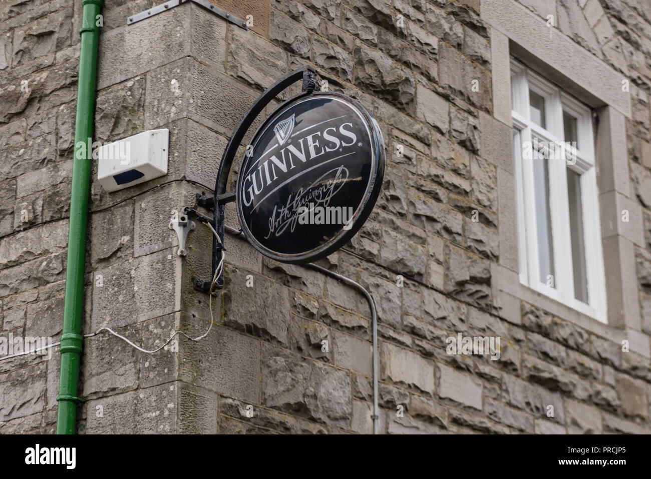 Guinness sign outside an Irish pub. Stock Photo