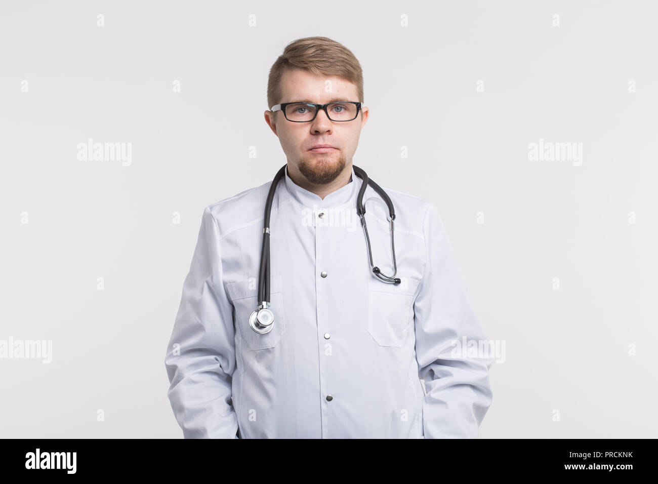 Handsome white doctor men in glasses and white medical gown Stock Photo ...