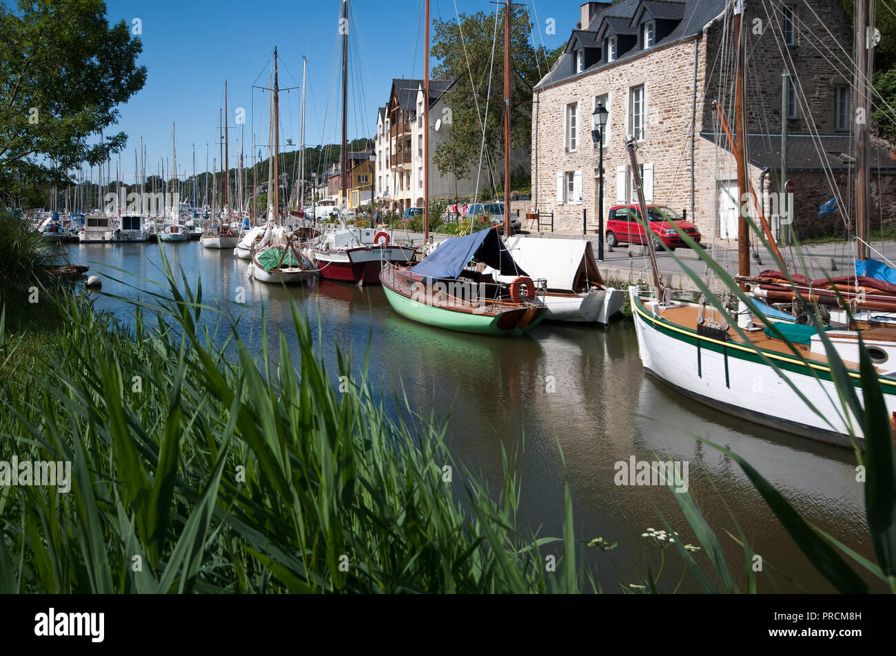 A picturesque inlet of the river, La Vilaine, which passes La Roche-Bernard, located in the Morbihan department of Brittany in north-western France Stock Photo