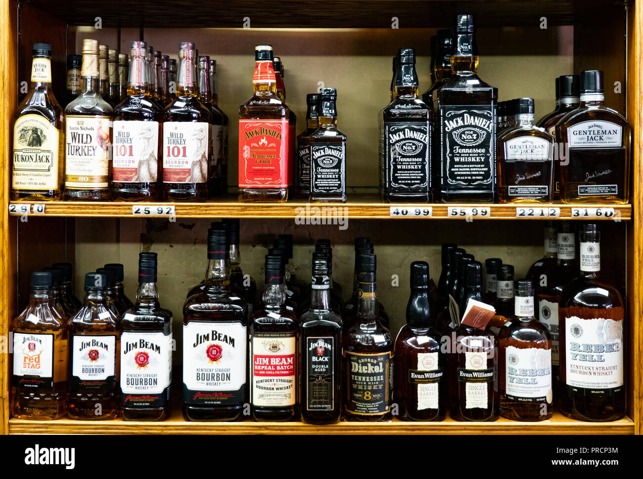 Shelves full of bottles of premium whiskey in a liquor store in Speculator, NY USA. Stock Photo