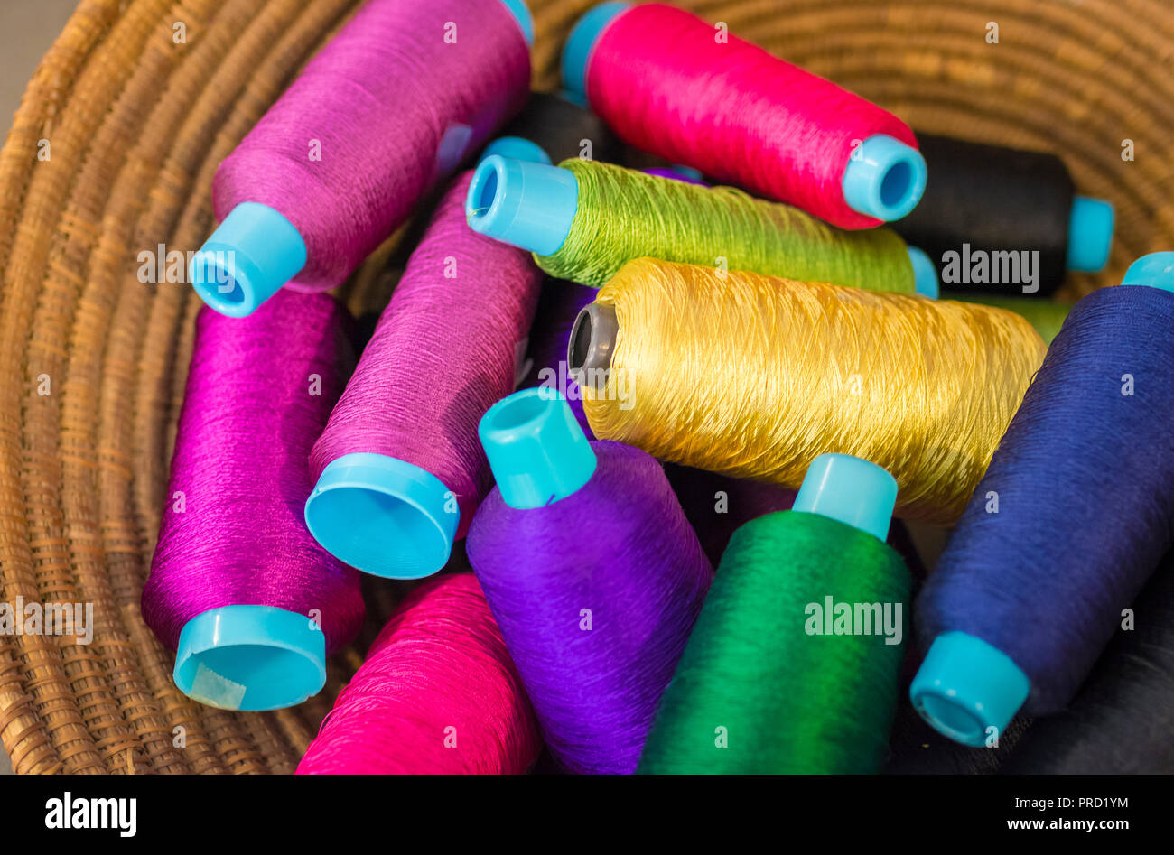 Close up of colorful spools of thread Stock Photo