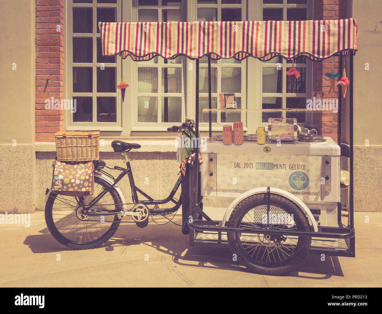 An ice cream cart is built on a bicycle in Cagliari, Sardinia, Italy. Vintage effect Stock Photo