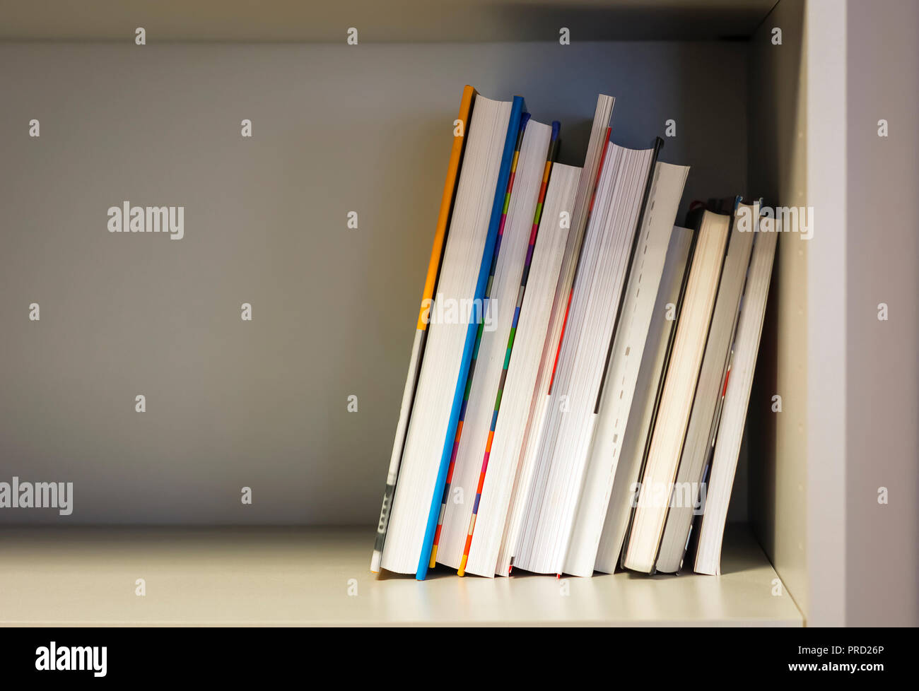 books on a shelf of a library Stock Photo
