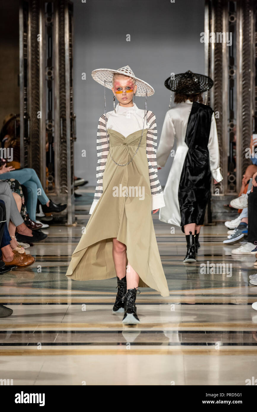 Fashion Spring Summer 2019 collection Model catwalk for Lunyee - London Fashion Scout show during London Fashion Week at Freemasons Hall Stock Photo
