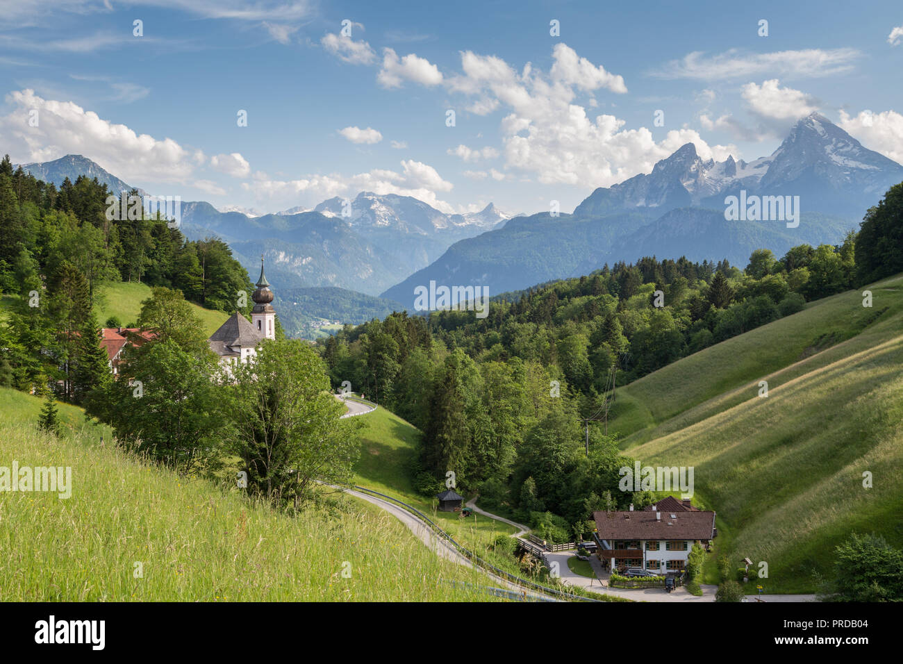 Maria Gern pilgrimage church with alpine meadow and farm in front of Watzmann, Berchtesgaden National Park, Berchtesgadener Land Stock Photo
