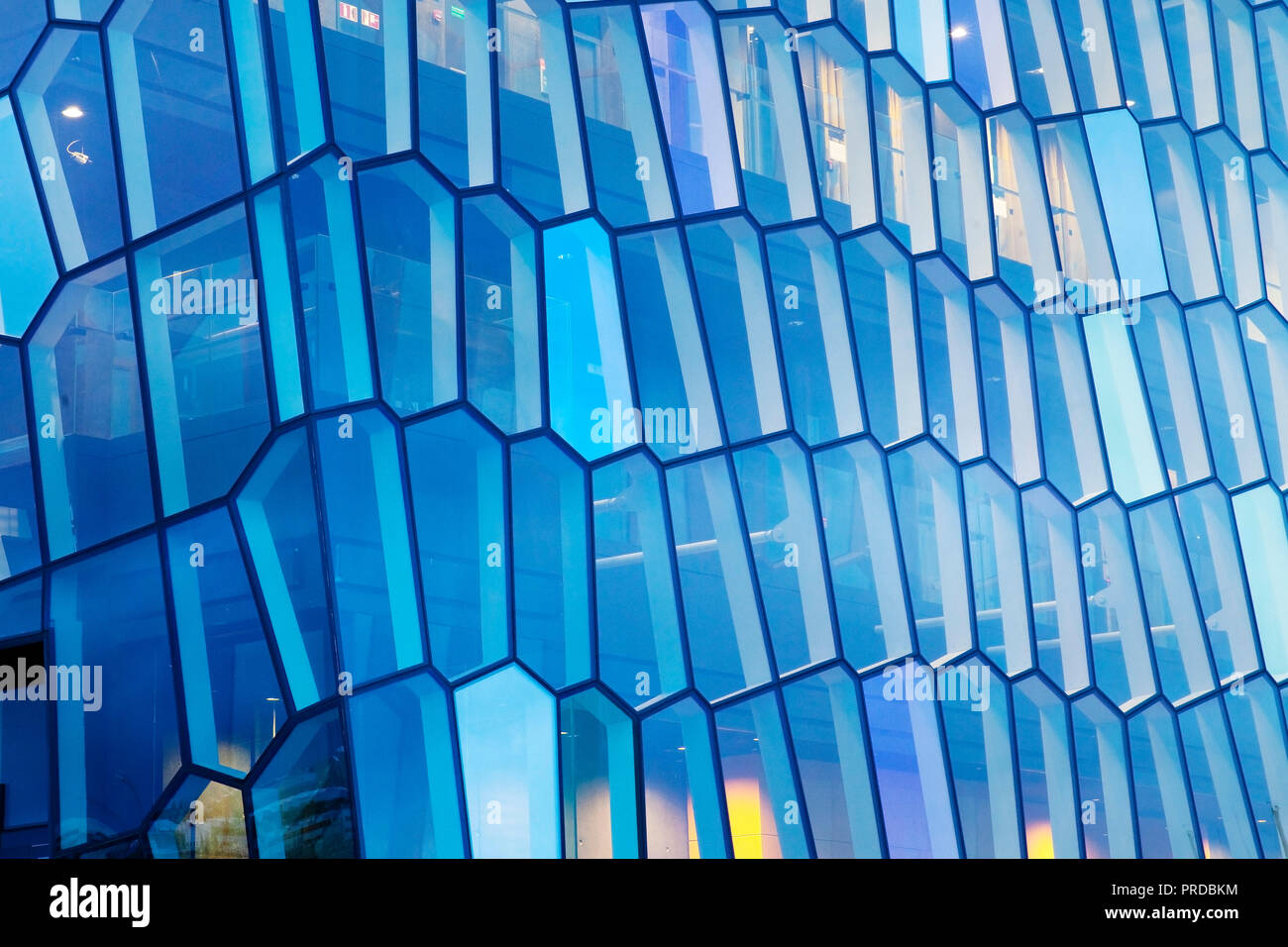 Facade detail of the honeycomb structure made of dichromatic glass by Olafur Eliasson, concert hall Harpa, Reykjavik, Iceland Stock Photo