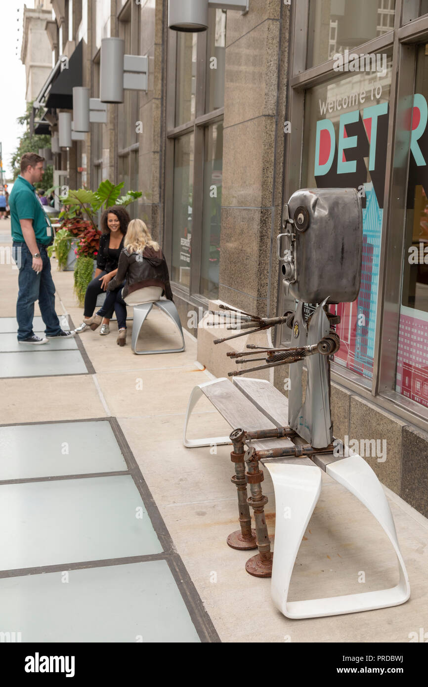 Detroit, Michigan - A metal sculpture by Tim Burke of the Detroit Industrial Gallery on a downtown bench. Stock Photo