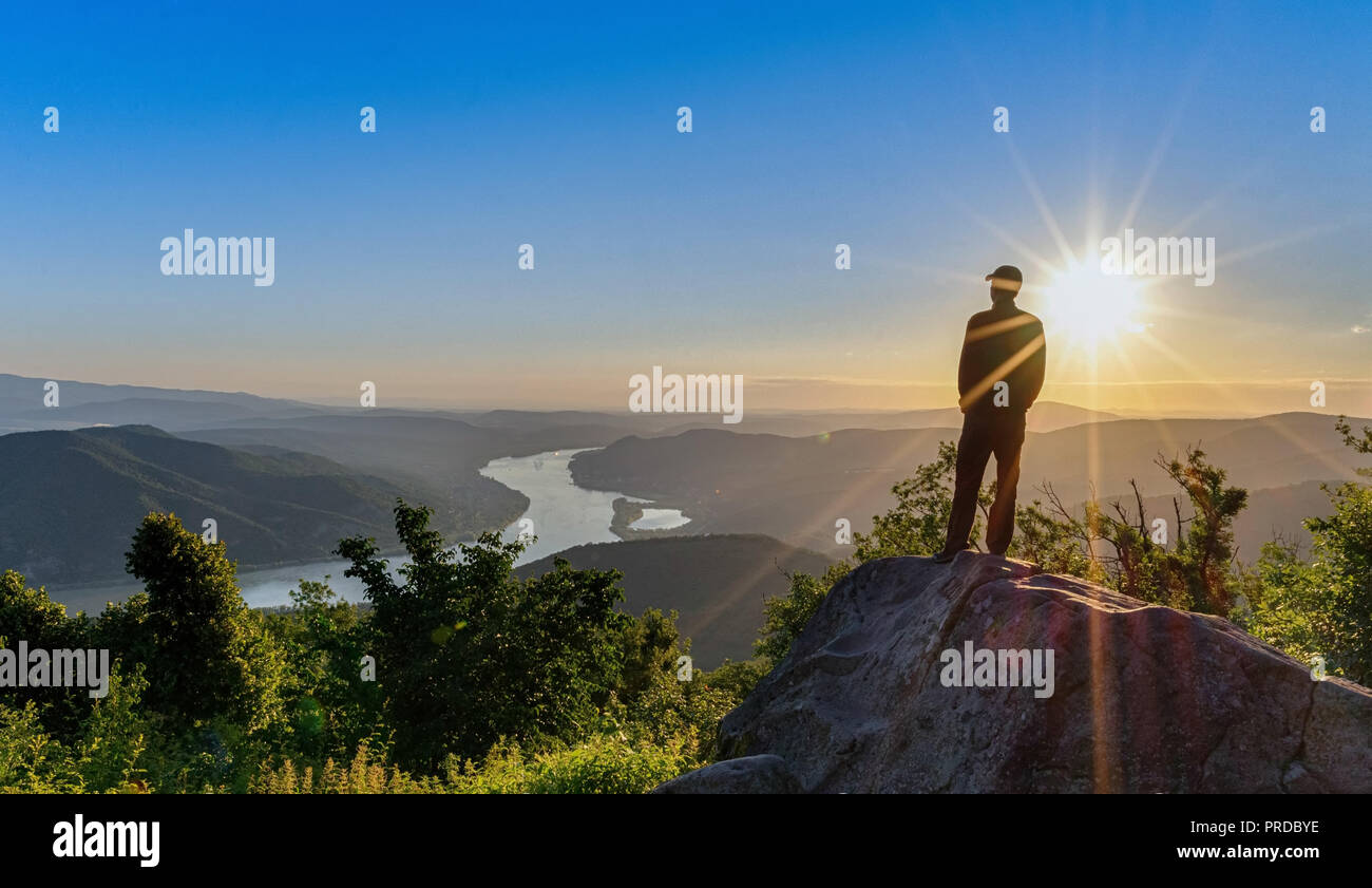 Hiker silhouette on rock ridge hi-res stock photography and images - Alamy