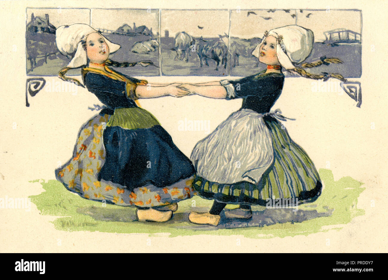 Girls in Dutch dress and clogs dance, Stock Photo