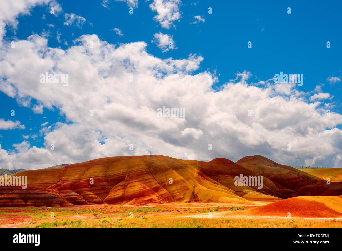 One of the seven wonders of Oregon the Painted Hills in the John Day Fossil Bed National Monument.  It's colorful layers formed after millions of year Stock Photo