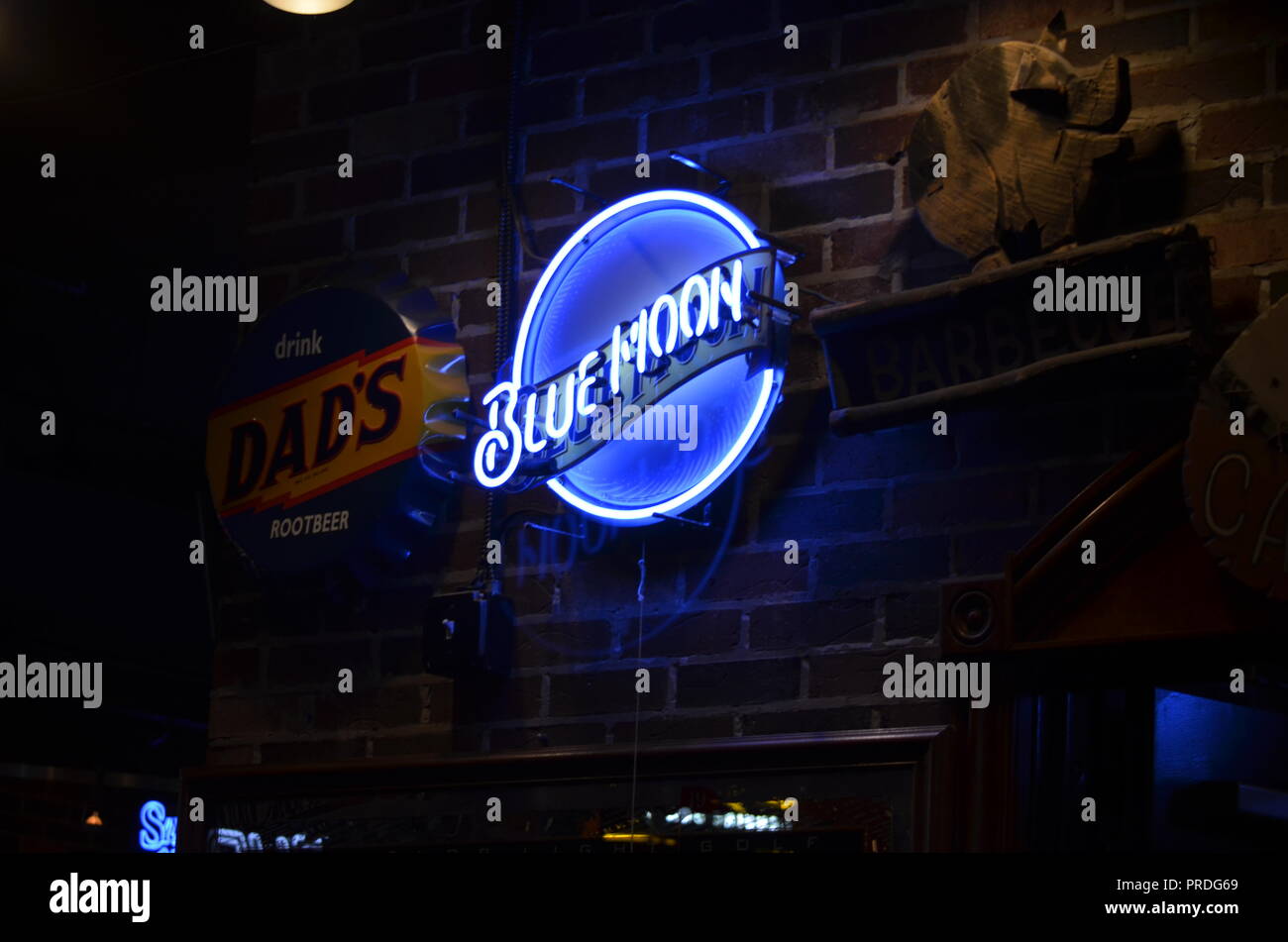 Blue Moon Beer Neon Sign In A Tavern Stock Photo - Alamy