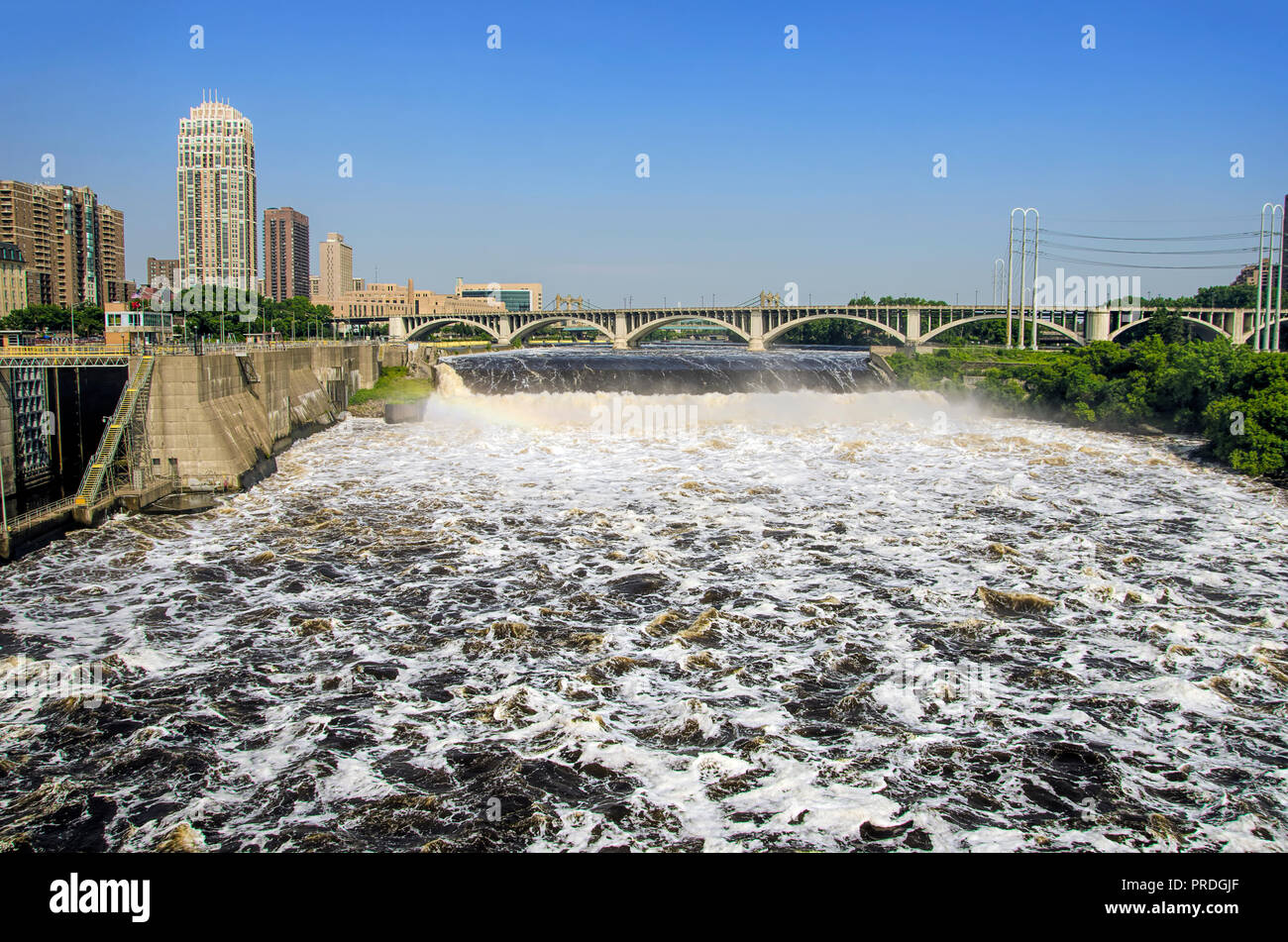Bridges over the Mississippi river in Minneapolis, with downtown buildings Stock Photo