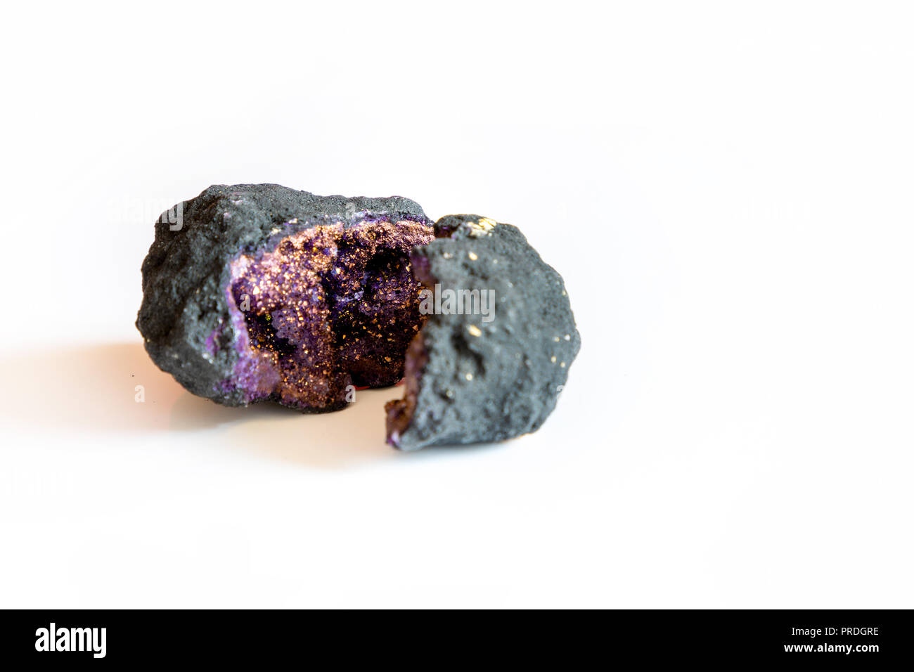 Purple amethyst crystal quartz with pyrite inside isolated on white Stock Photo