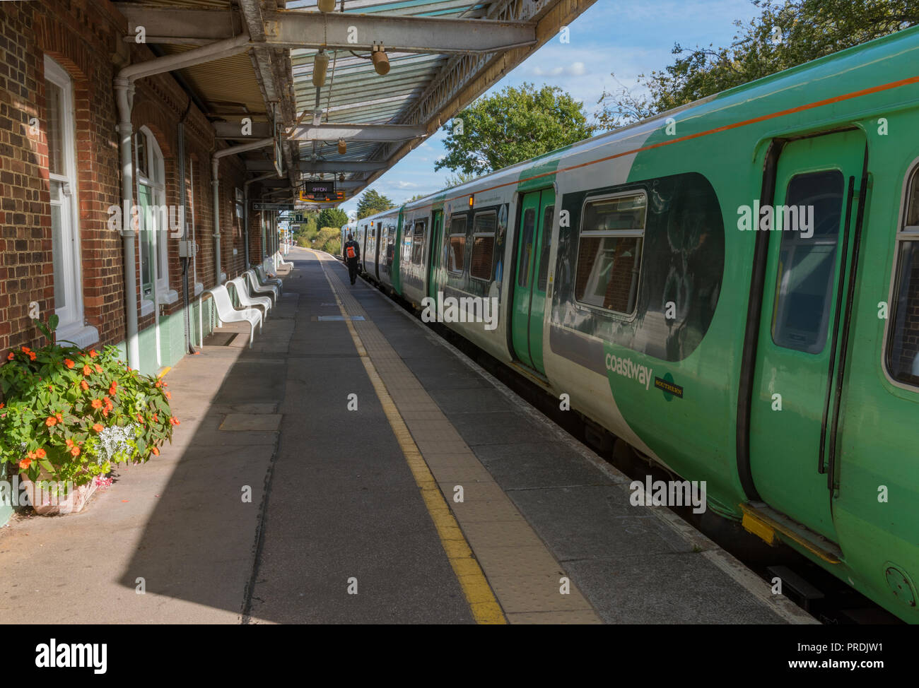 southern railway train in the platform at Barnham station in west sussex. Stock Photo