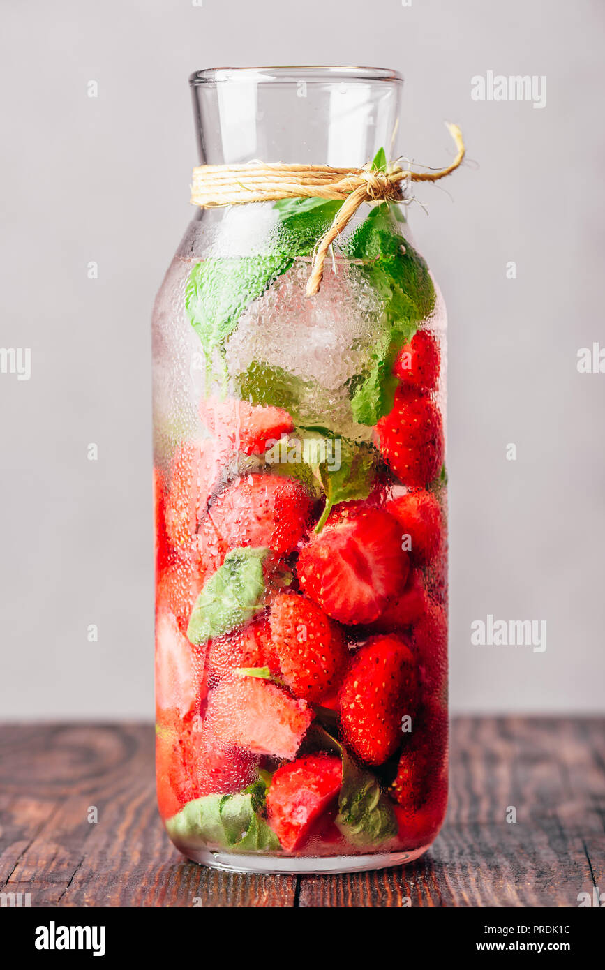 Bottle of Water Infused with Fresh Strawberry and Basil Leaves and Ice ...