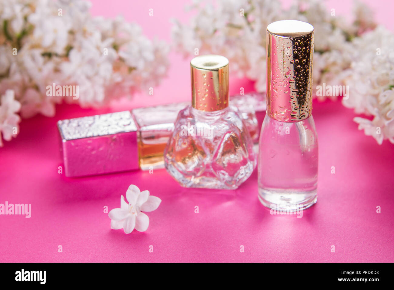 A bottle of perfume sitting on top of a table photo – Free Perfume