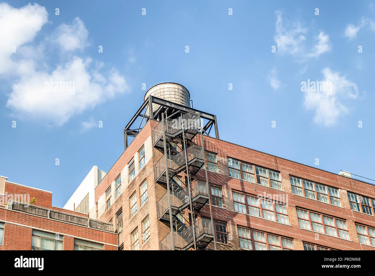 Water towers or rooftop Water Tank on an Apartment Building with Fire