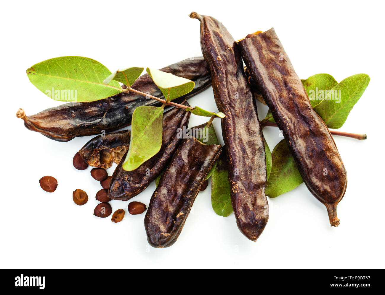 Carob beans with powder. Healthy organic sweet carob pods with seeds on  white background. Top view Stock Photo - Alamy