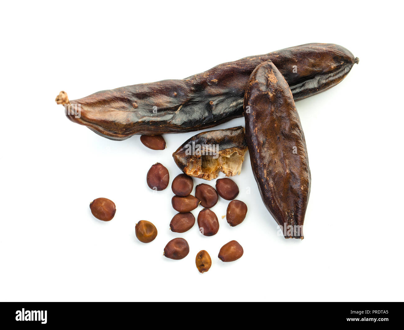 Carob on white background. Carob pods and seeds Stock Photo Alamy