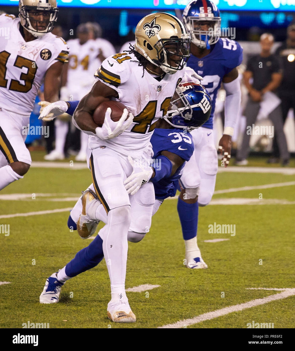 East Rutherford, New Jersey, USA. 2nd Oct, 2018. New Orleans Saints running  back Alvin Kamara (41) is off to a long touchdown run in the second half  after breaking a tackle attempt