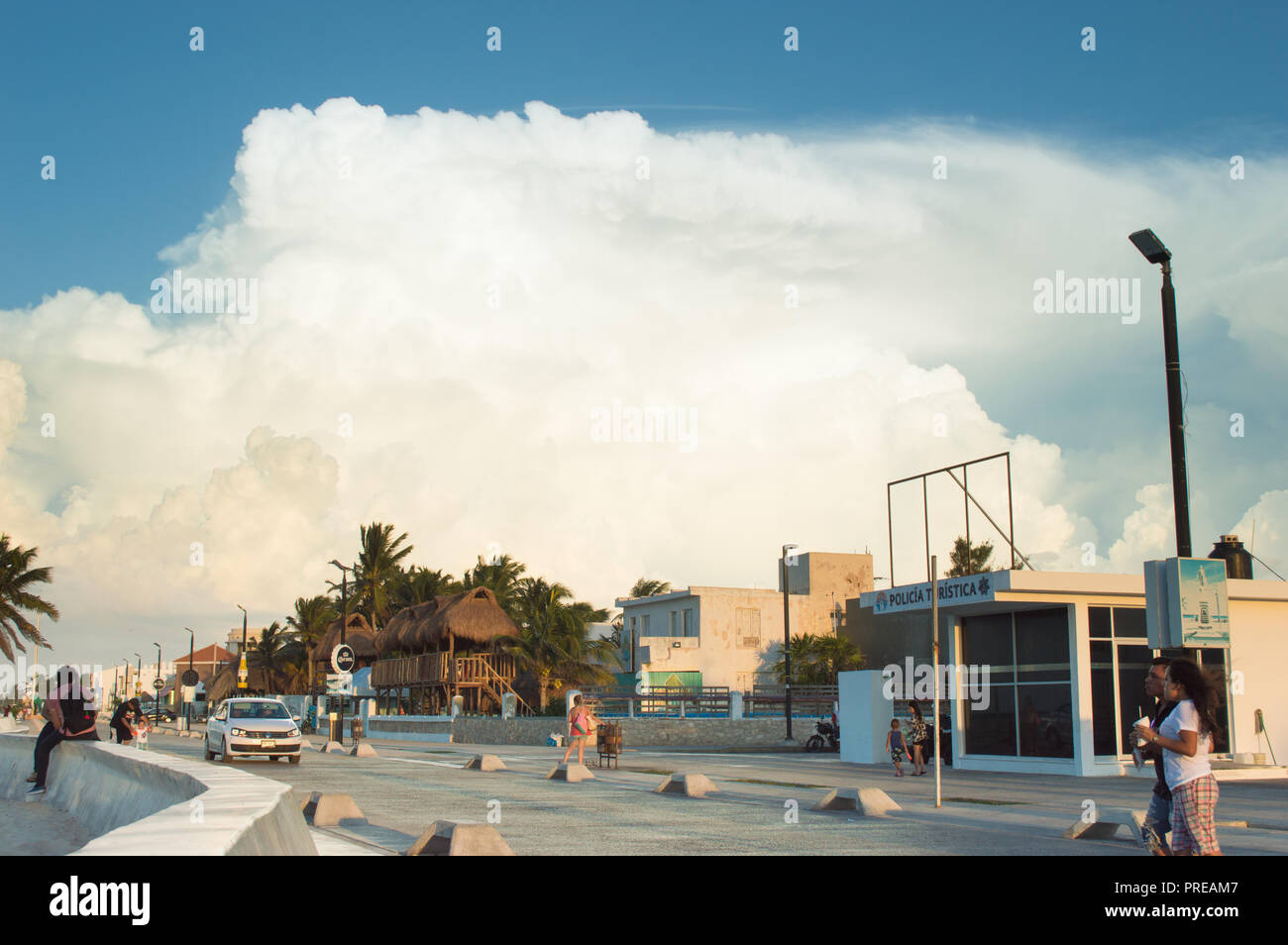 View of the Malecon, seaside in Progreso Yucatan. In the background a massive cloud. Stock Photo