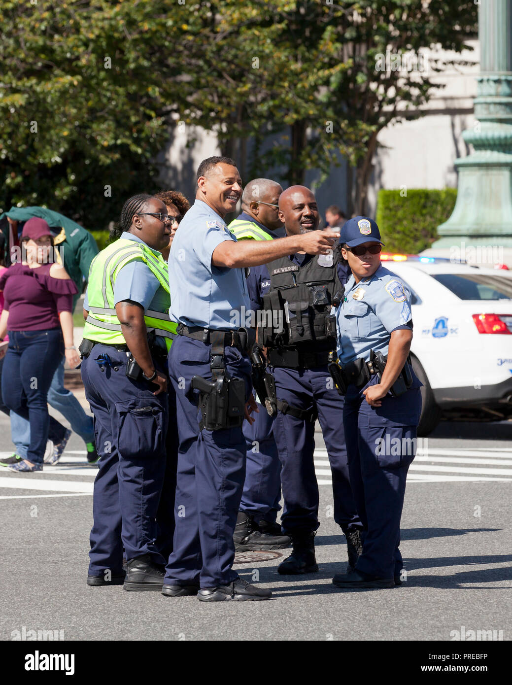 Police officers together at an outdoor event - Washington, DC USA Stock Photo